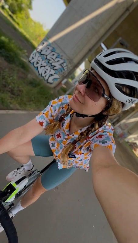 Riding under a bridge in a Pamera shirt